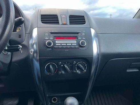 Suzuki SX4 2010 красный - фото 22