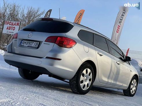 Opel Astra 2011 - фото 14