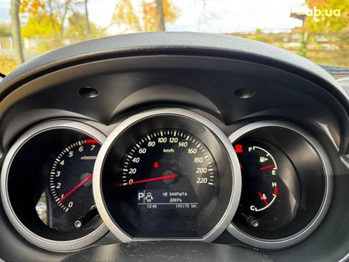 Suzuki Grand Vitara 2010 белый - фото 13