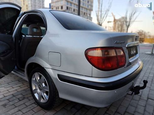 Nissan Almera 2001 - фото 12