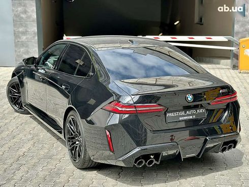 BMW M5 2025 - фото 24