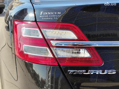 Ford Taurus 2016 черный - фото 6