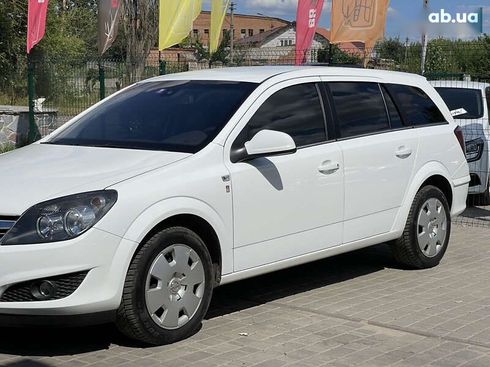 Opel Astra 2010 - фото 11