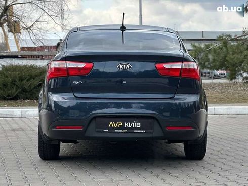 Kia Rio 2013 - фото 12