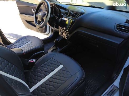 Kia Rio 2012 - фото 12