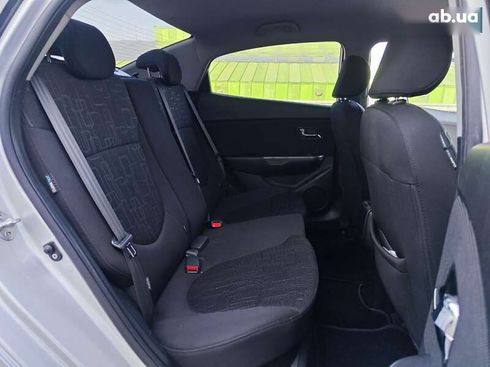 Kia Rio 2012 - фото 11
