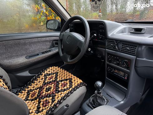 Daewoo Nexia 2006 серый - фото 26