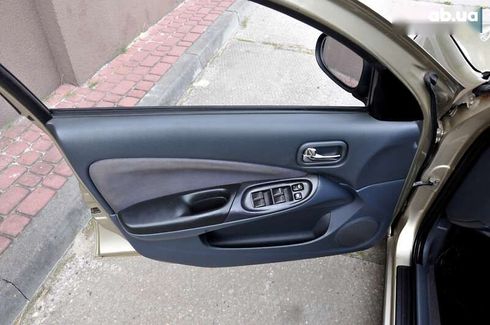 Nissan Almera 2004 - фото 15