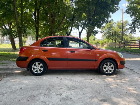 Kia Rio 2008 оранжевый - фото 6