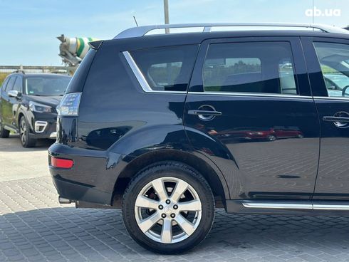 Mitsubishi Outlander XL 2010 черный - фото 9
