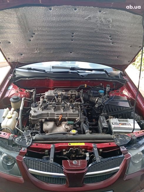 Nissan Almera 2004 вишневый - фото 3