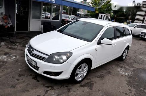 Opel Astra 2010 - фото 21