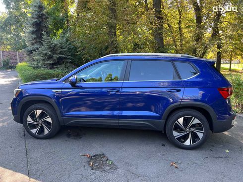 Volkswagen Taos 2023 синий - фото 8