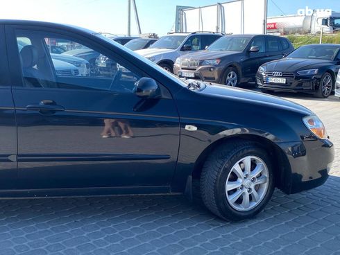 Kia Cerato 2008 черный - фото 10