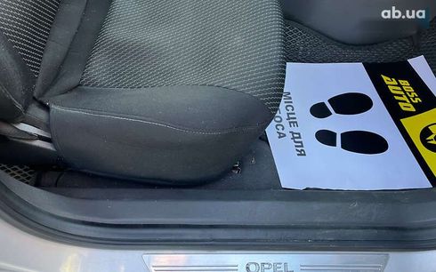 Opel Astra 2010 - фото 23