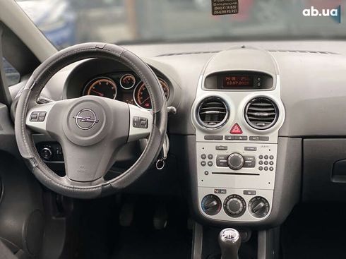 Opel Corsa 2011 - фото 20
