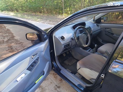 Geely MK 2012 черный - фото 11
