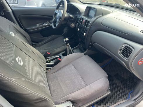 Nissan Almera 2005 серый - фото 17