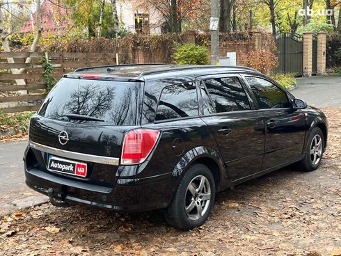 Opel Astra 2006 черный - фото 12