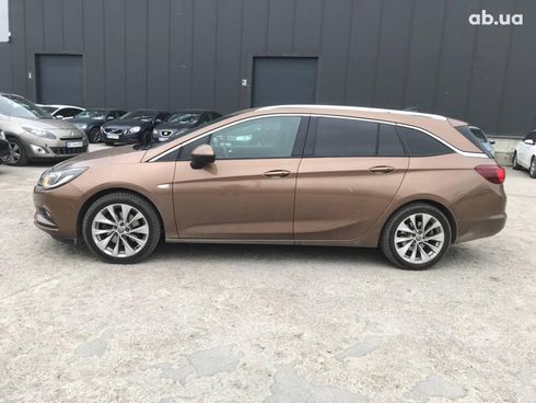 Opel Astra 2016 коричневый - фото 4