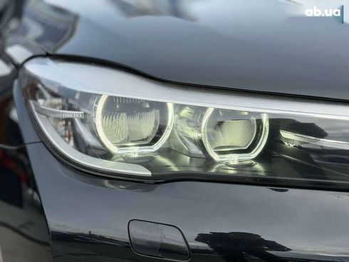 BMW 7 серия 2015 - фото 12
