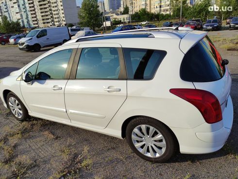 Peugeot 308 2012 белый - фото 6