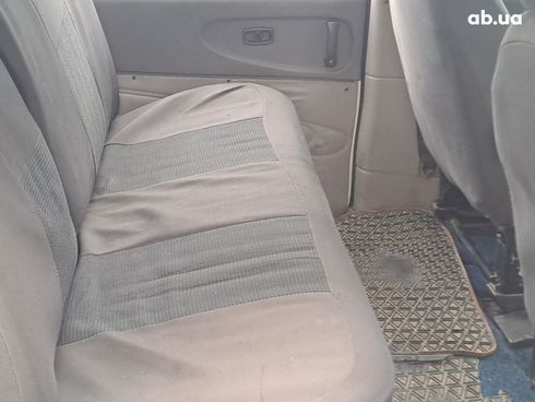 Mitsubishi L 400 2000 белый - фото 7