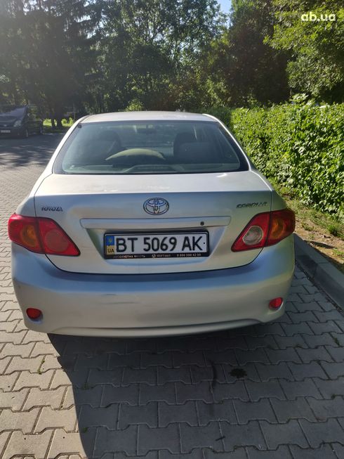 Toyota Corolla 2008 серебристый - фото 6