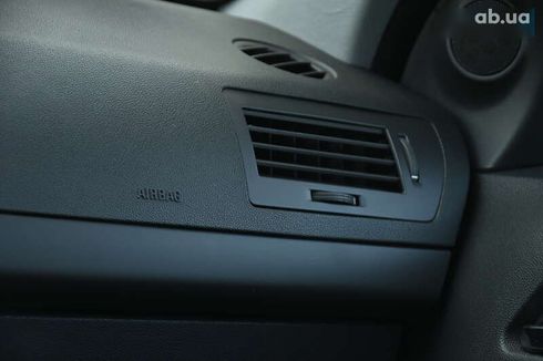 Opel Astra 2009 - фото 23