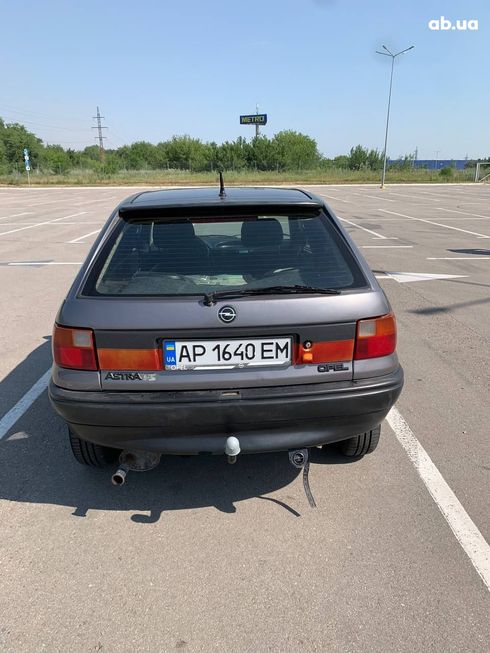 Opel Astra 1992 серый - фото 2