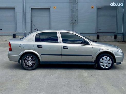 Opel Astra 2008 - фото 14