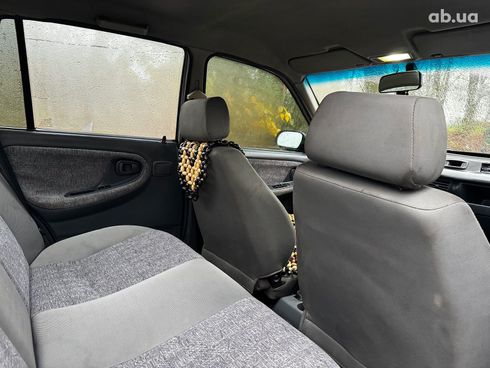 Daewoo Nexia 2006 серый - фото 23