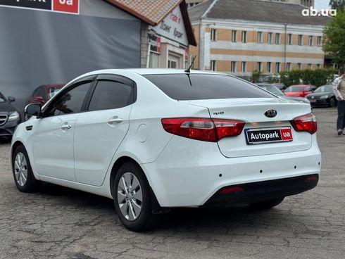 Kia Rio 2013 белый - фото 8