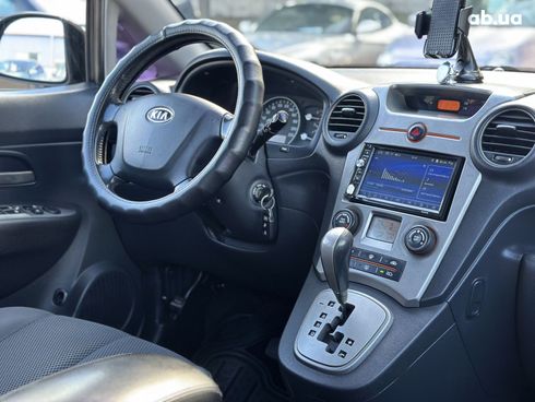 Kia Carens 2008 черный - фото 12