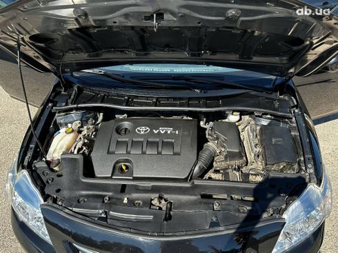 Toyota Corolla 2008 черный - фото 11
