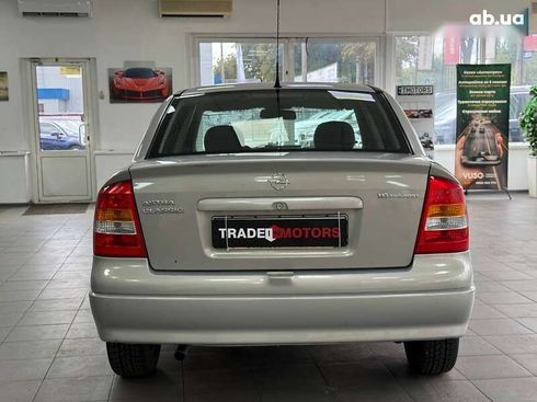 Opel Astra 2007 - фото 15