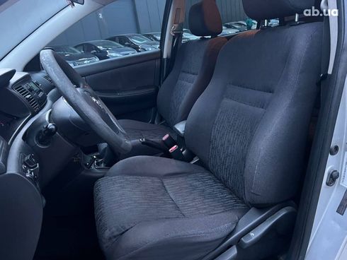 Toyota Corolla 2002 серый - фото 18