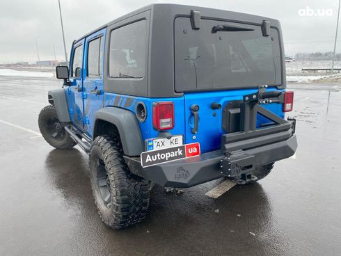 Jeep Wrangler 2014 синий - фото 9