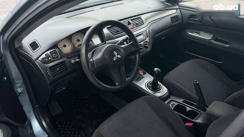 Mitsubishi Lancer 2006 - фото 18