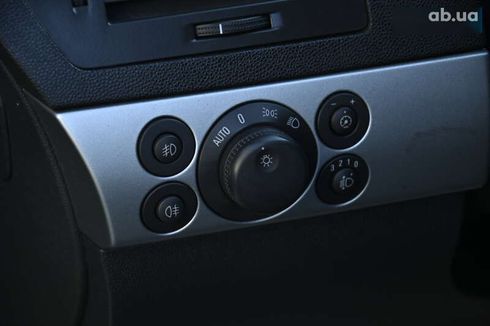 Opel Astra 2009 - фото 14