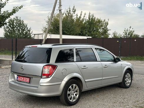 Opel Astra 2008 - фото 15