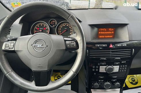 Opel Astra 2010 - фото 21