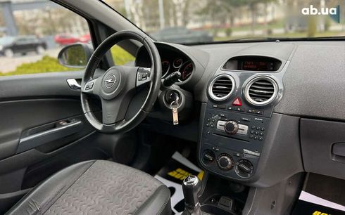 Opel Corsa 2011 - фото 10