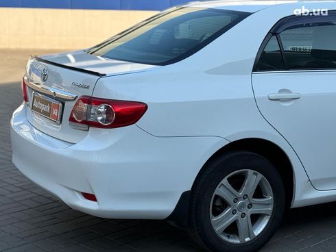 Toyota Corolla 2010 белый - фото 5