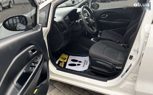 Kia Rio 2013 - фото 9