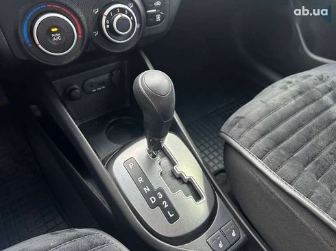 Kia Rio 2012 - фото 26