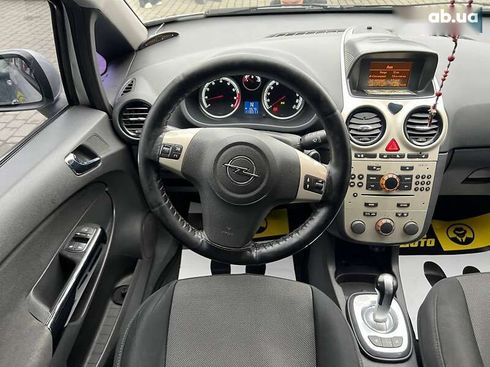Opel Corsa 2008 - фото 17