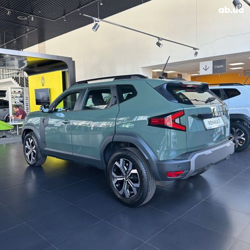 Renault Duster 2025 зеленый - фото 2