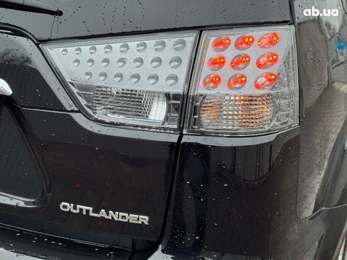 Mitsubishi Outlander XL 2011 черный - фото 9