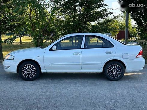 Nissan Almera 2011 - фото 8